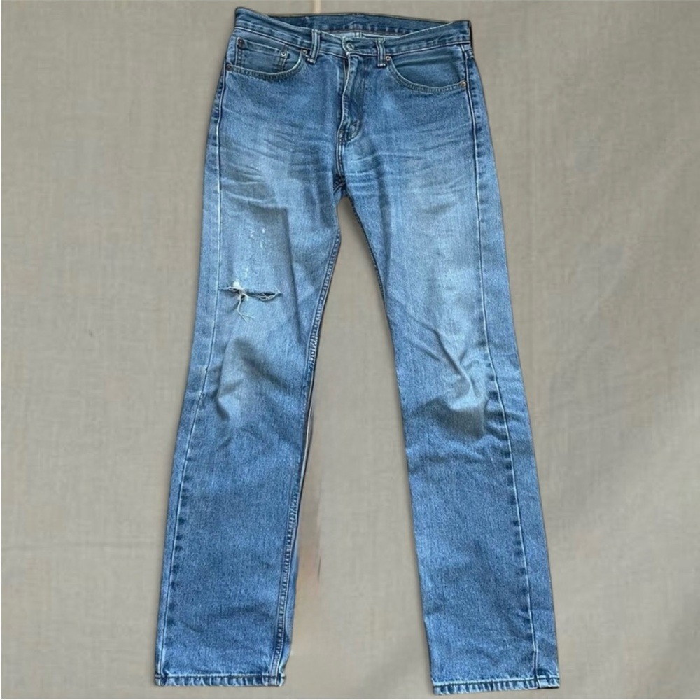 Distressed blue Levi's 505 straight leg jeans 31x36